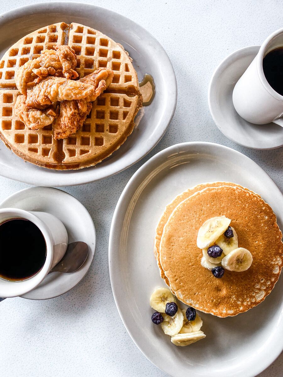 Chicken and waffles and buttermilk pancakes with coffee